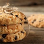 Tasty cookies on rustic wooden background