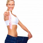 Weightloss Concept - Healthy young woman on white