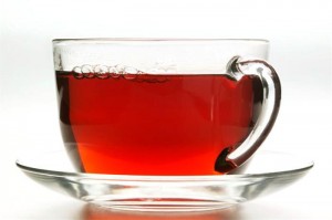 Hot hibiscus tea in glass cup